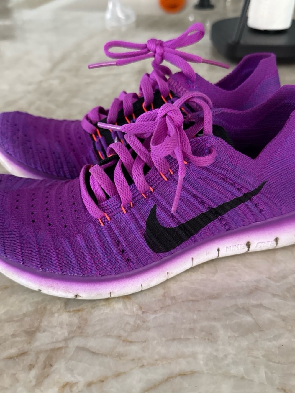 Nike Women's Purple Flyknit Training Shoes with Black Swoosh